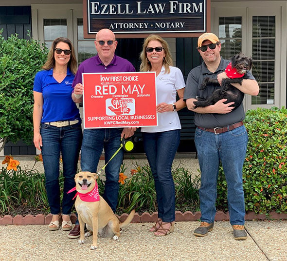 Attorneys And Staff With Their Dogs
